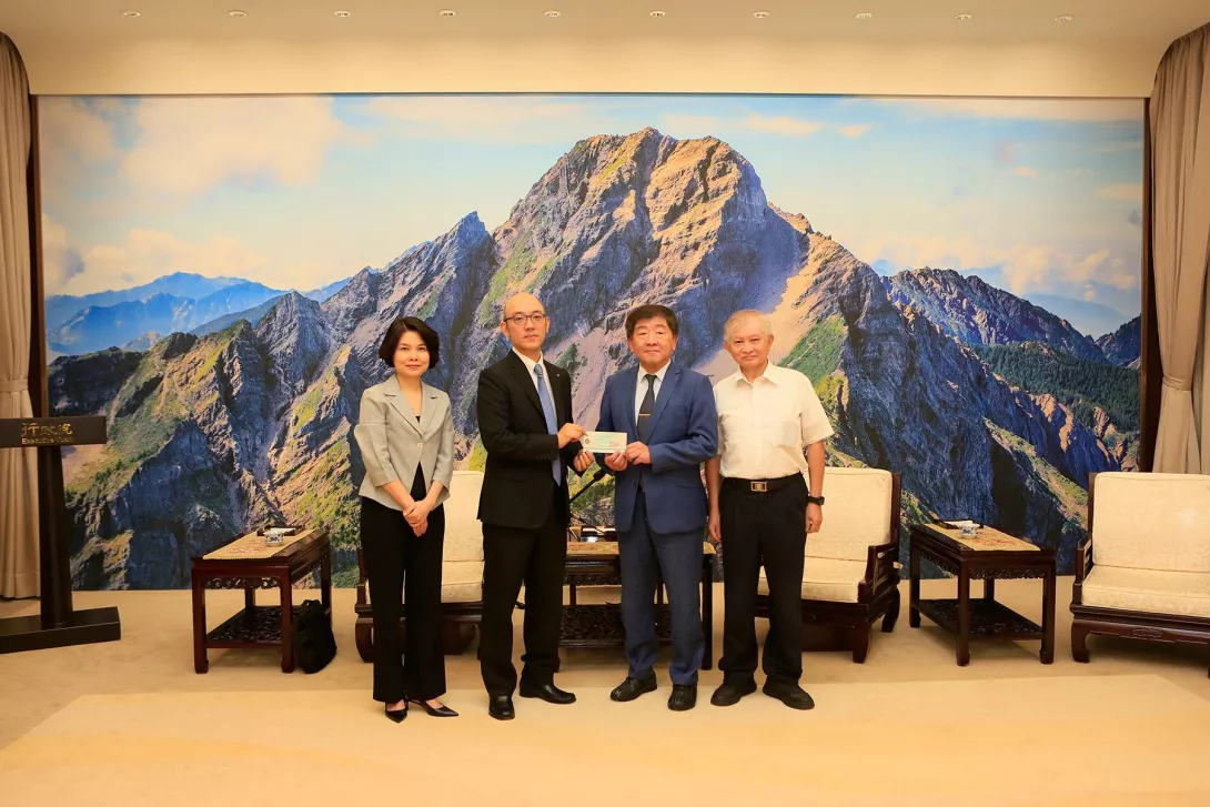 創價到行政院捐款